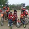 Three generations in the saddle: Steven Mallo, with grandsons Mathias, twins Maleko and Malaki,  and son Ben Mallo at Prairie City OHV Park, Rancho Cordova, Calif.